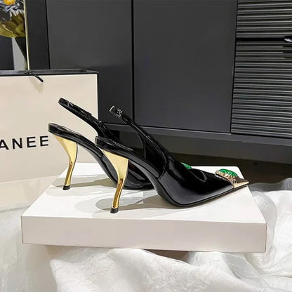 Elegant and fashionable red high heel sandals adorned with fox head jewels, a must-have for trendy women's wardrobes.