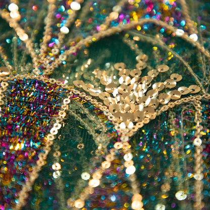 Sophisticated 120cm wide mesh lace fabric adorned with elaborate sequins, designed for creating premium party and bridal attire.