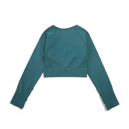 Luxurious WAREBALL seamless yoga set for women, featuring a stylish sports bra and leggings in elegant green shade, perfect for upscale fitness enthusiasts.