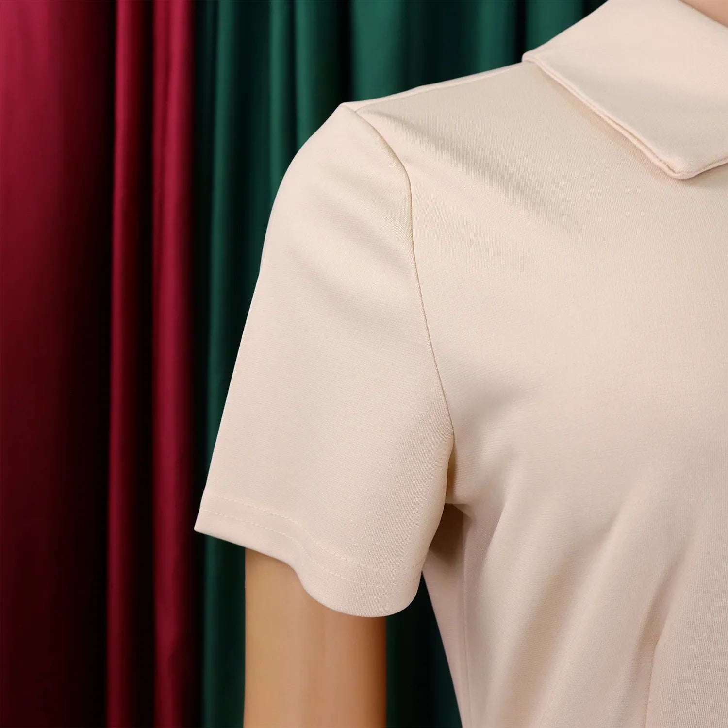 Close-up view of the luxurious polyester and spandex fabric of the high-waisted knee-length evening dress, designed for a flattering silhouette.