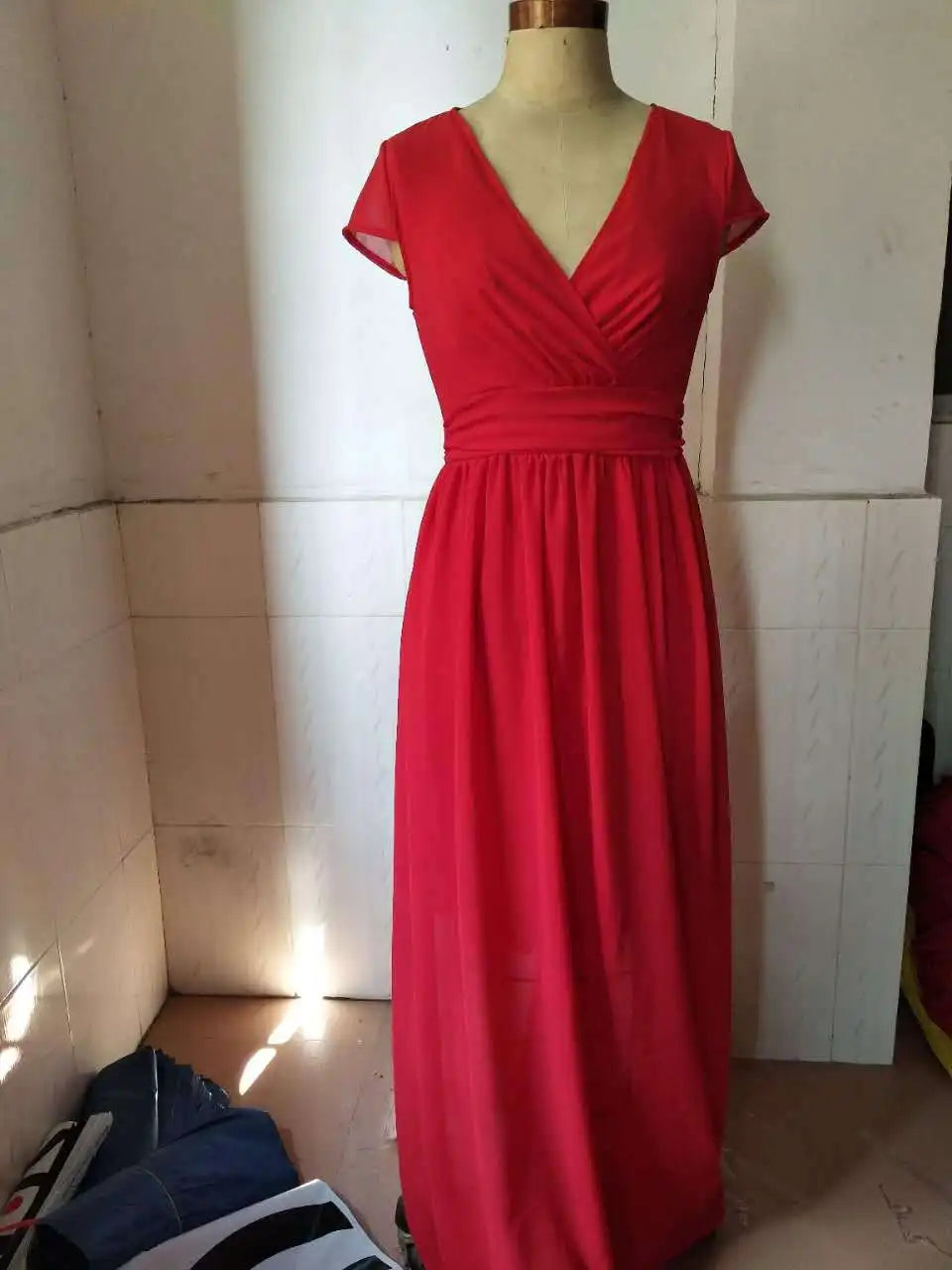 Luxury women's ankle-length chiffon dress with short sleeves, exuding femininity and grace, designed for the modern woman.