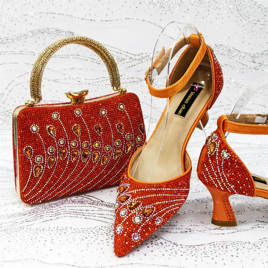 Elegant women's rhinestone pointed toe pumps with high spike heels and matching handbag, perfect for summer parties. Luxurious design featuring bling details and a comfortable fit.