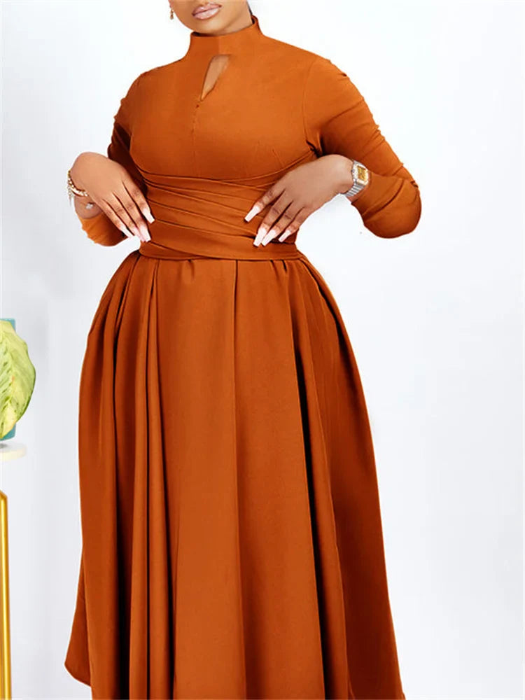 Graceful plus size Ankara party dress for women, designed with a slim fit and slight stretch for comfort and elegance in every movement.