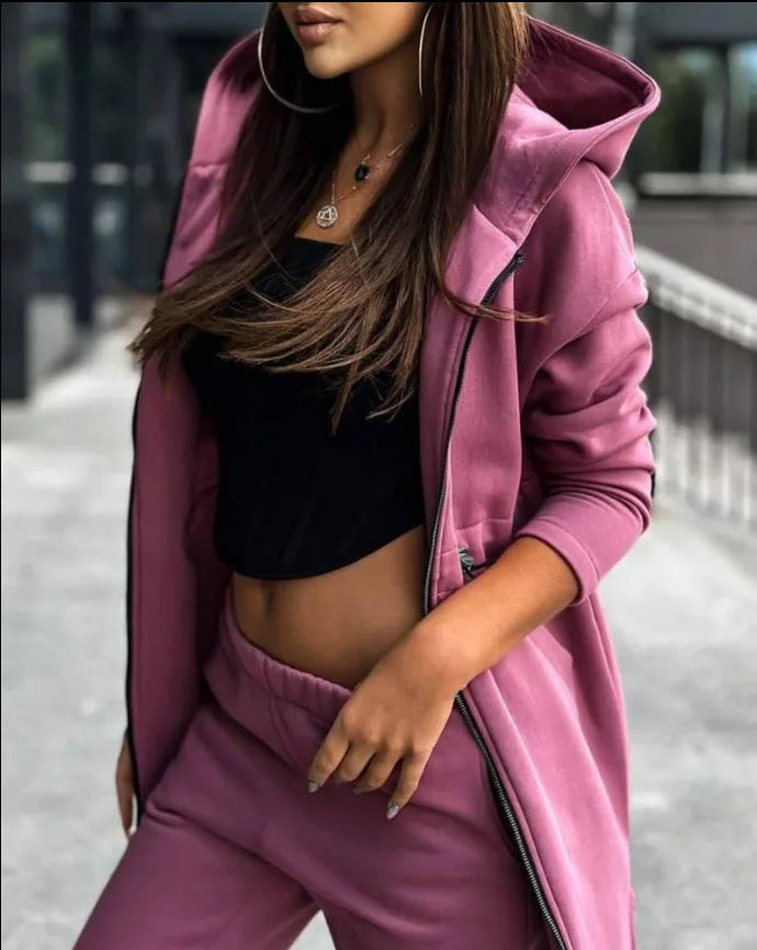 Side view of a women's tracksuit with ankle-length pants, illustrating the smooth fit and flattering cut designed for sophisticated women.