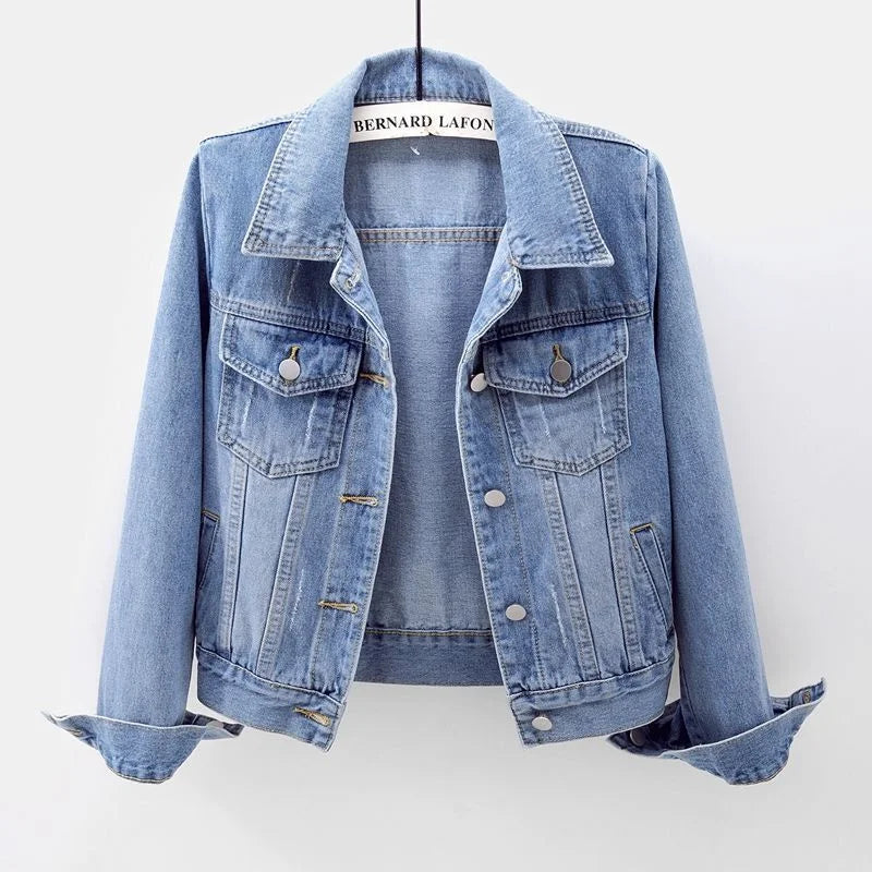 Luxury women's loose denim jacket with long sleeves, showcasing a casual button overcoat design in stylish blue fabric.
