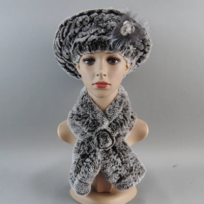 Fashionable women's faux fur hat and scarf set, showcasing sophisticated winter style with high-quality materials.