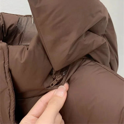 Chic women's winter coat with zipper closure, bringing warmth and sophistication to your seasonal wardrobe.