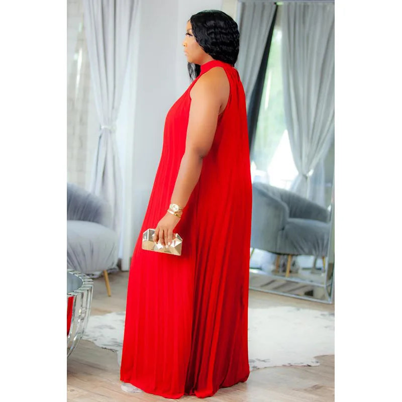 Luxurious floor-length maxi dress in solid color, designed for women, adorned with pleats for a refined elegance.