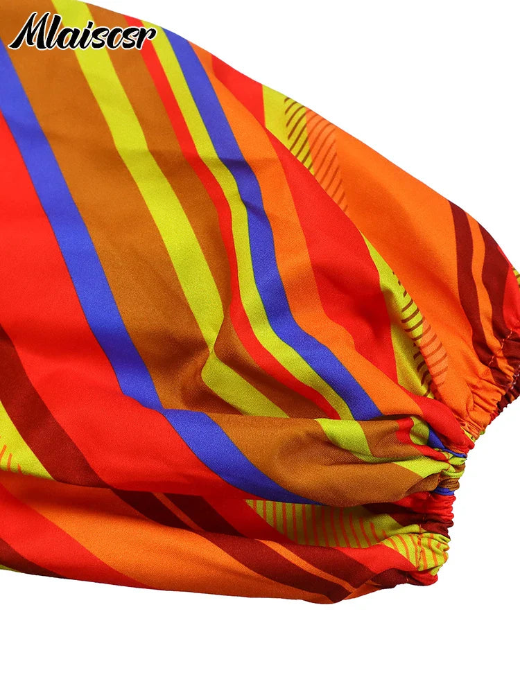 Luxurious bohemian style Mlaiscsr pleated dress, ideal for sophisticated outings, highlighting its relaxed fit and sophisticated appeal.