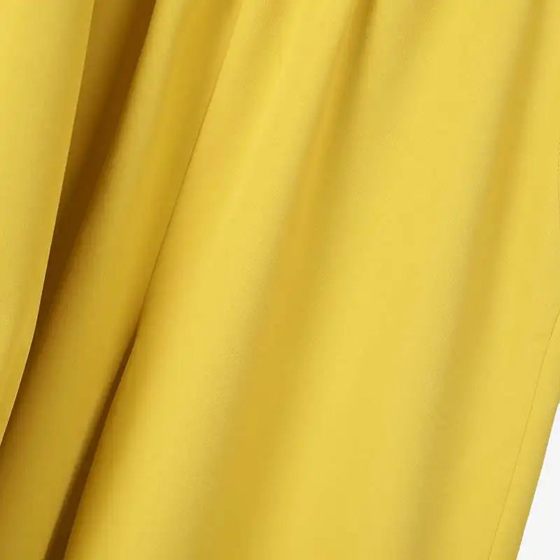 Full view of the wide leg pants from the women's 2PCS set, crafted from high-quality fabric to provide an elegant and trendy silhouette for any occasion.