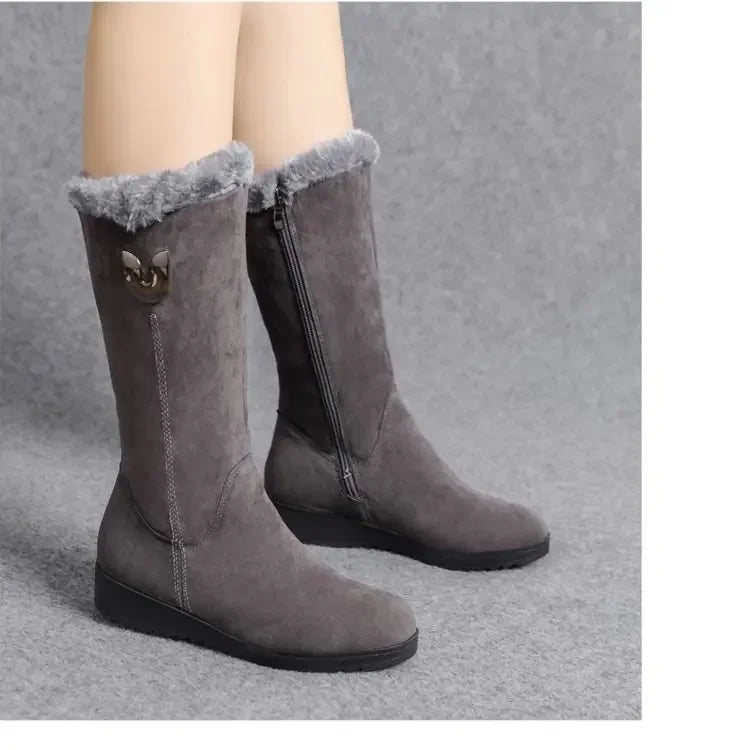 Luxury women's warm high fur boots with chunky mid-calf silhouette and side zip, crafted from soft faux suede for winter elegance.