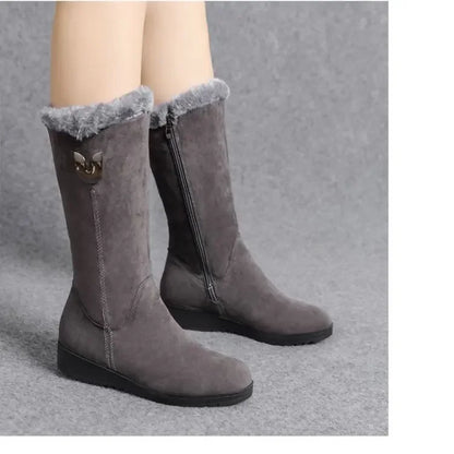 Luxury women's warm high fur boots with chunky mid-calf silhouette and side zip, crafted from soft faux suede for winter elegance.