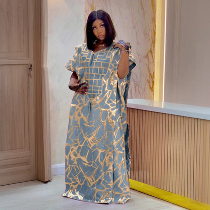 Luxury satin abaya for women with elegant tassel details, perfect for Dubai style and African caftan fashion.