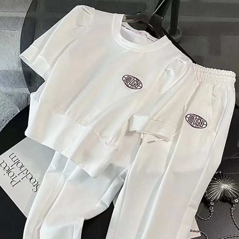 Sophisticated women's sports outfit with a sweet style, high-quality materials, perfect for a range of summer activities.