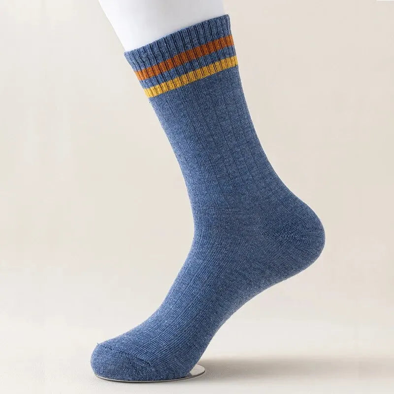Elegant 5 pairs of men's winter sports socks in assorted colours, designed for comfort and style.