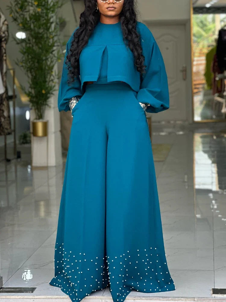 Elegant 2-piece women's outfit set featuring a sophisticated O-neck embroidered lantern sleeve top and high-waisted wide-leg trousers, perfect for casual party wear.