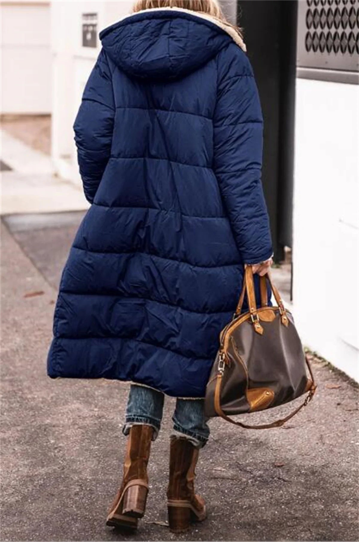 Stylish women's thick winter coat with a hood, designed for comfort and warmth, blending luxury fashion with practicality for the modern woman.