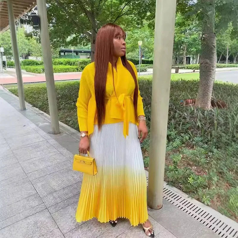 CM.YAYA Women's luxurious gradient full sleeve blouse featuring a flattering V-neck design, complemented by a stylish belt and a pleated long skirt set, perfect for autumn and winter elegance.