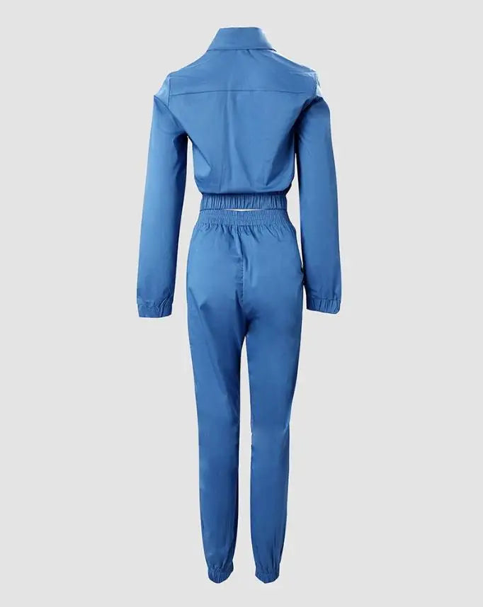 Close-up of the stylish high waist pants from the elegant two-piece denim tracksuit for women, showcasing premium polyester fabric and solid colour.