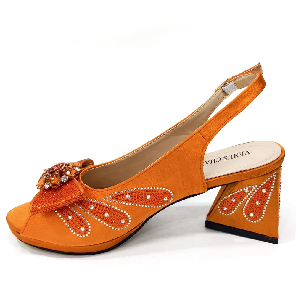 Close-up of rhinestone details on Venus Chan purple heels, highlighting the luxurious embellishments that add sparkle and glamour to any outfit.