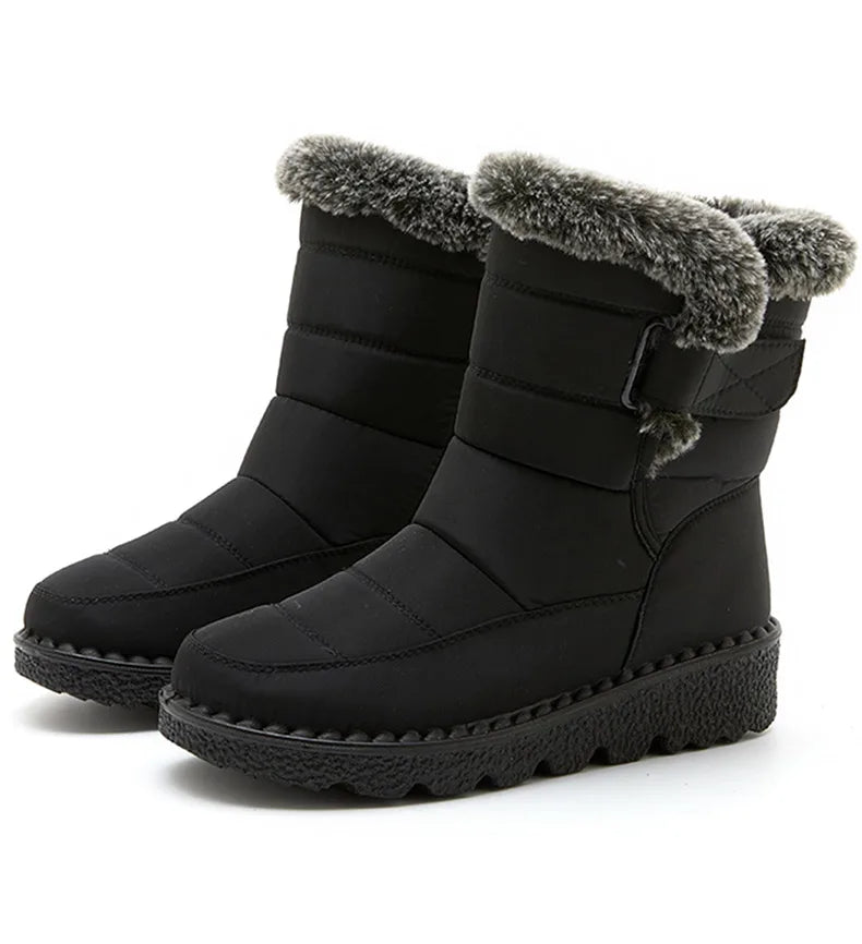 Inside view of luxury waterproof ankle snow boots for women, featuring soft plush insole and fine craftsmanship for ultimate comfort and style.