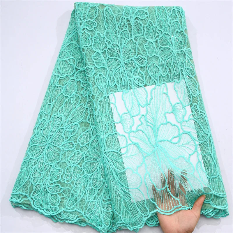 Luxurious African Milk Silk Mesh Lace Fabric for elegant wedding dresses, embellished with intricate sequins and exquisite embroidered tulle.