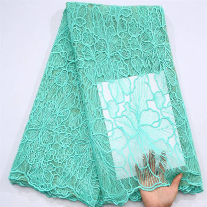 Luxurious African Milk Silk Mesh Lace Fabric for elegant wedding dresses, embellished with intricate sequins and exquisite embroidered tulle.