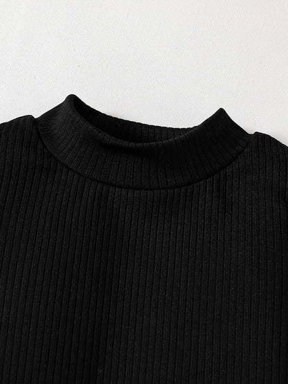 Luxurious girls' autumn fashion set featuring an off-shoulder turtleneck top and half skirt, designed for ages 4-6, in elegant solid colour.