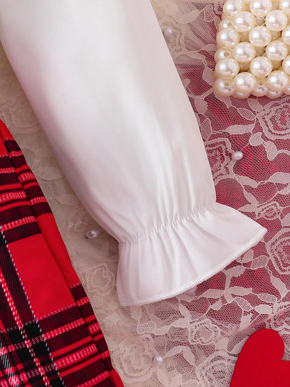 Stylish complete view of girls' fashionable knitted set, showcasing the vibrant red tank top and checkered skirt, perfect for ages 4-6.