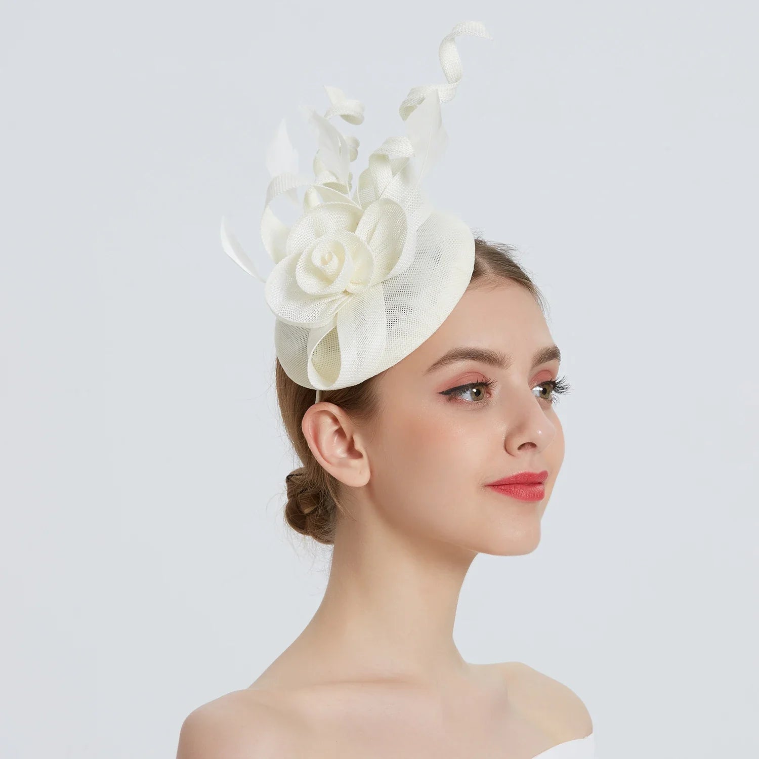 Sophisticated folding headband fascinator, ideal for festival occasions and special celebrations.