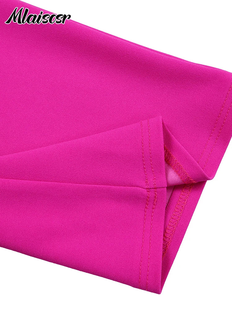 Stylish office attire featuring Mlaiscsr's sophisticated feather print design, perfect for modern, fashionable women.