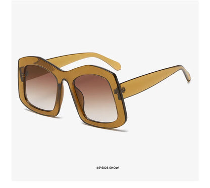 Close-up view of women’s luxury oversized square sunglasses featuring gradient lenses and durable polycarbonate construction, ideal for summer fashion.