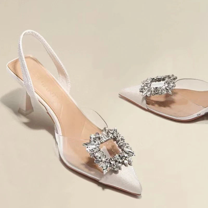 BCEBYL Women’s elegant crystal transparent high heel pumps with a pointed toe, perfect for glamorous parties.