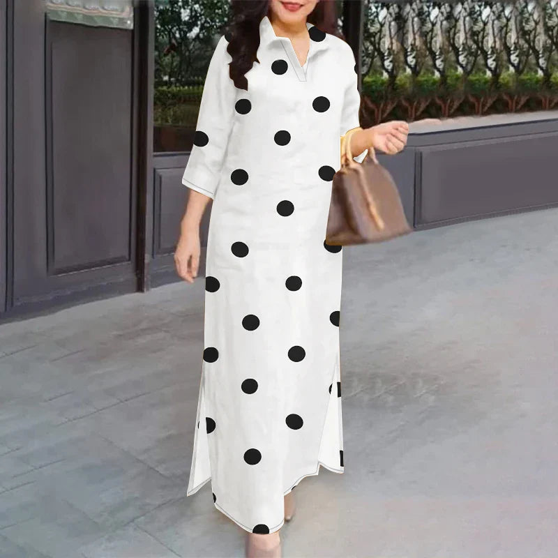 Stunning view of the loose fit plus-size summer sundress with polka dots, highlighting its flattering silhouette and luxurious fabric ideal for warm weather.