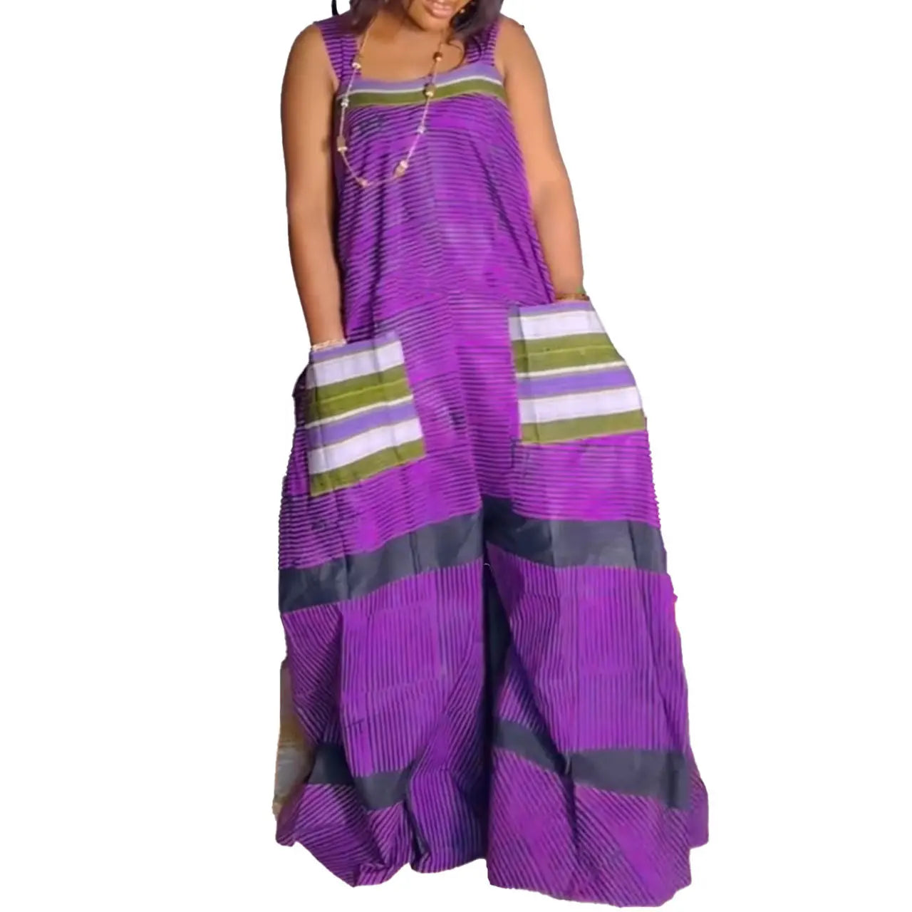 Close-up view of the premium fabric texture of the CM.YAYA Striped Wide Leg Sleeveless Jumpsuit, highlighting its luxurious polyester material and chic stripes.