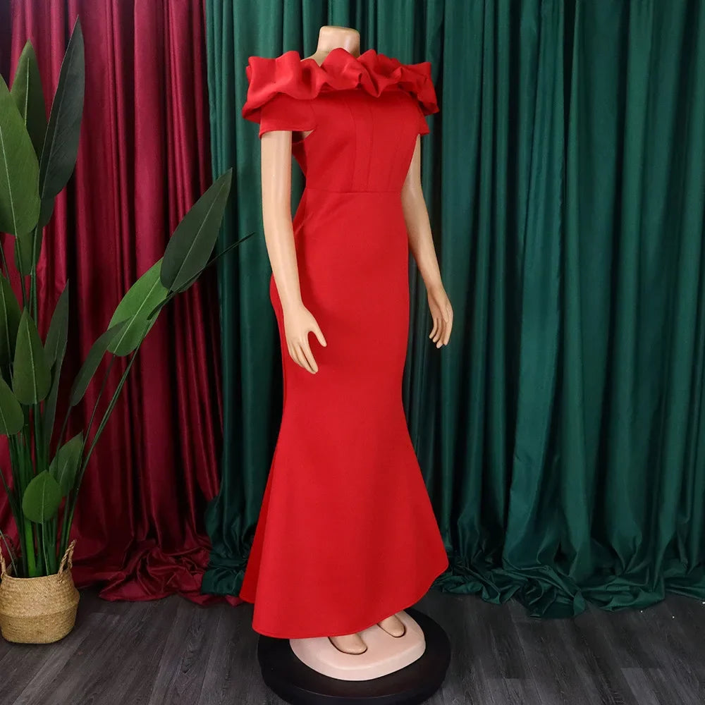 Close-up of the ruffled details on the elegant off-shoulder mermaid dress, highlighting the exquisite craftsmanship and luxurious polyester fabric.