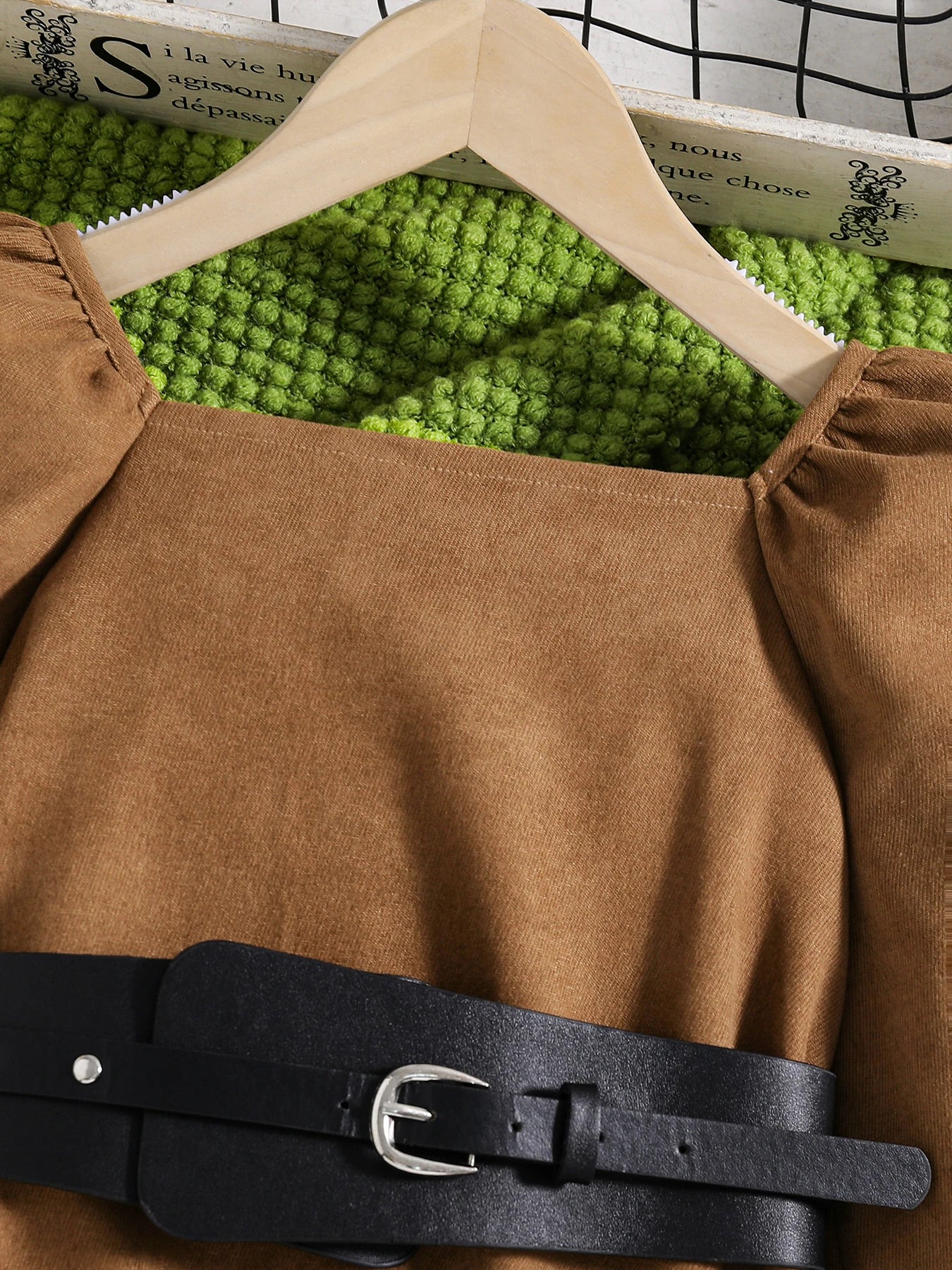 Gorgeous knee-length pleated dress for girls, combining a stylish silhouette with plush puff sleeves, exuding elegance and charm.