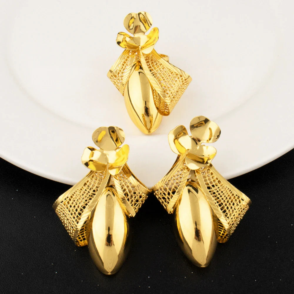 Elegant gold plated bow tie necklace showcasing intricate design, perfect for formal occasions and party attire.