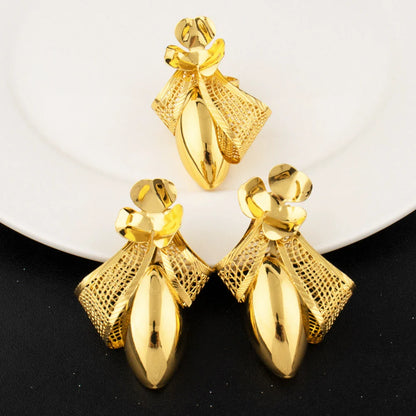 Elegant gold plated bow tie necklace showcasing intricate design, perfect for formal occasions and party attire.