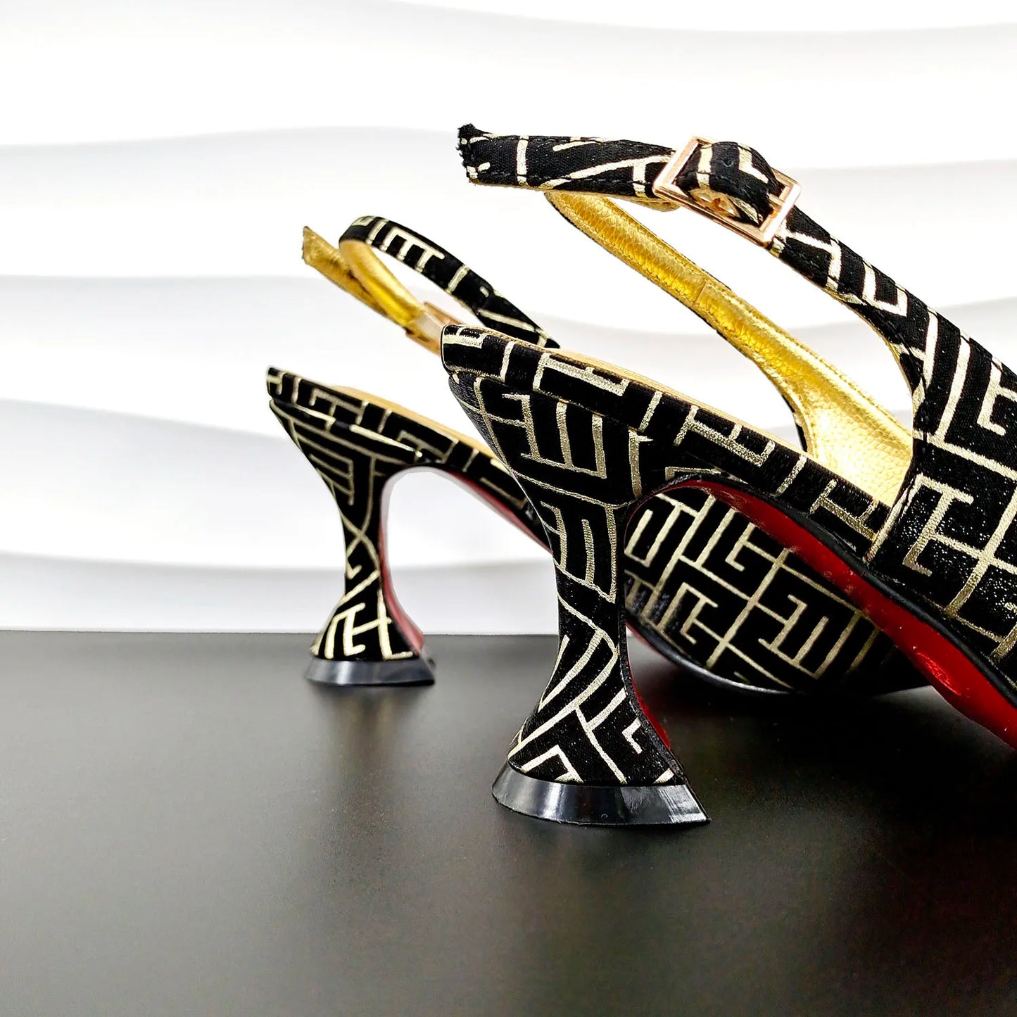 Close-up view of women's high heels featuring a butterfly-knot design, showcasing high-quality PU material for exquisite style and comfort.