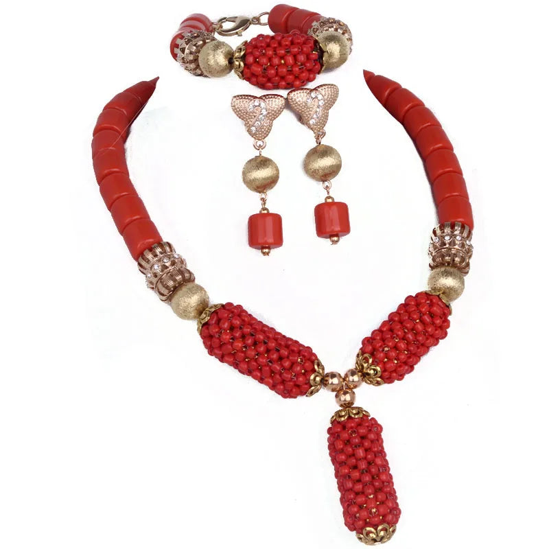 Artistic display of Dudo Orange Balls Coral Beads jewelry set including necklace, earrings, and bracelet; a timeless fashion statement for weddings and special occasions.