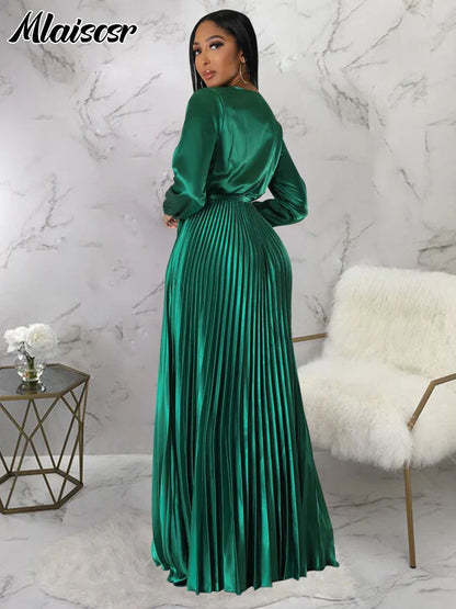 Model wearing Mlaiscsr Women's Pleated Swing Dress at an autumn wedding, capturing elegance with a flattering V-neckline and flowing fabric.