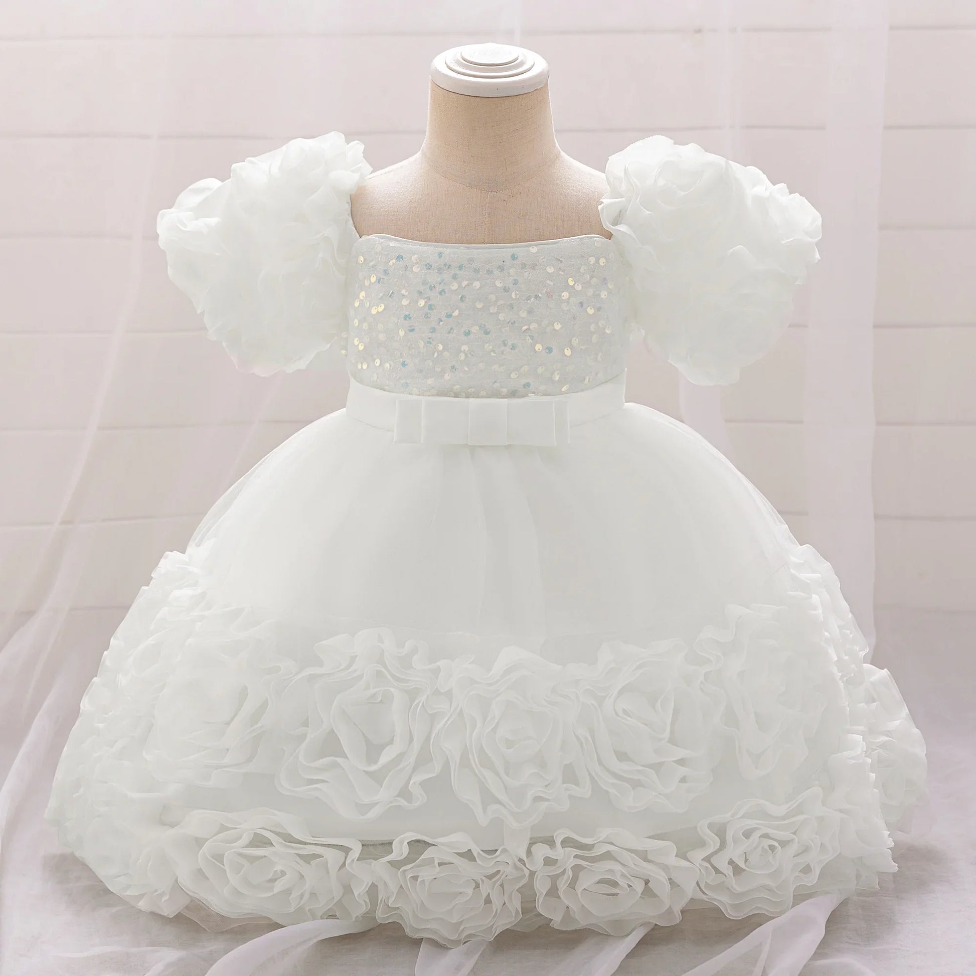 Lovely knee-length ball gown for girls, designed with a beautiful floral pattern, ideal for any festive celebration.