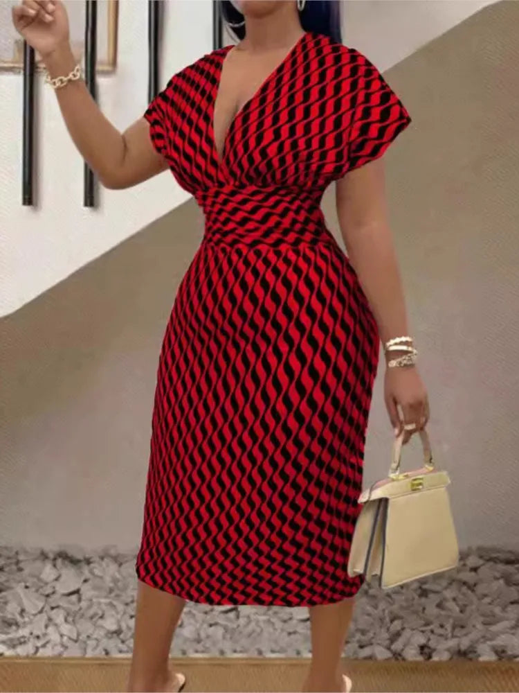 Chic high-waisted women's midi dress with a stunning print, designed with a deep V neckline and short sleeves for a sophisticated look.