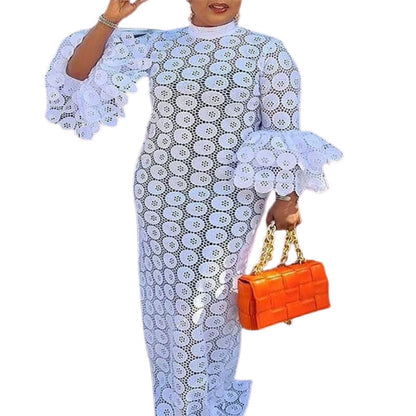 Luxury maxi abaya robe in white colour, designed for women, showcasing a sophisticated long sleeve style ideal for African cultural weddings.