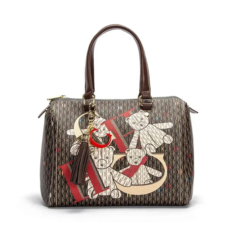 Elegant zipper closure crossbody bag designed for women, showcasing a colourful geometric pattern and sophisticated style.