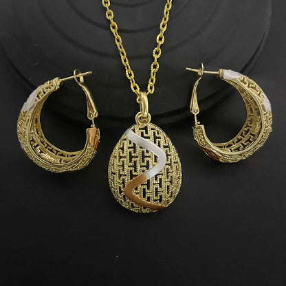 Beautifully arranged 24K gold-plated geometric necklace and earrings set, embodying sophistication and style for modern women.