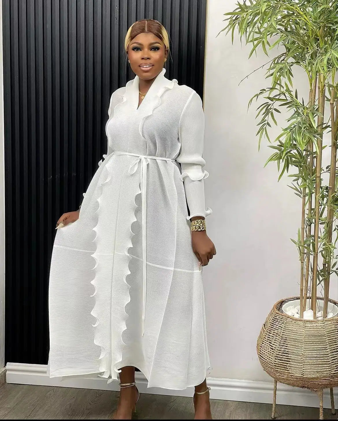 Sashes detailing on a chic loose abaya dress, showcasing a sophisticated style suitable for festive occasions.