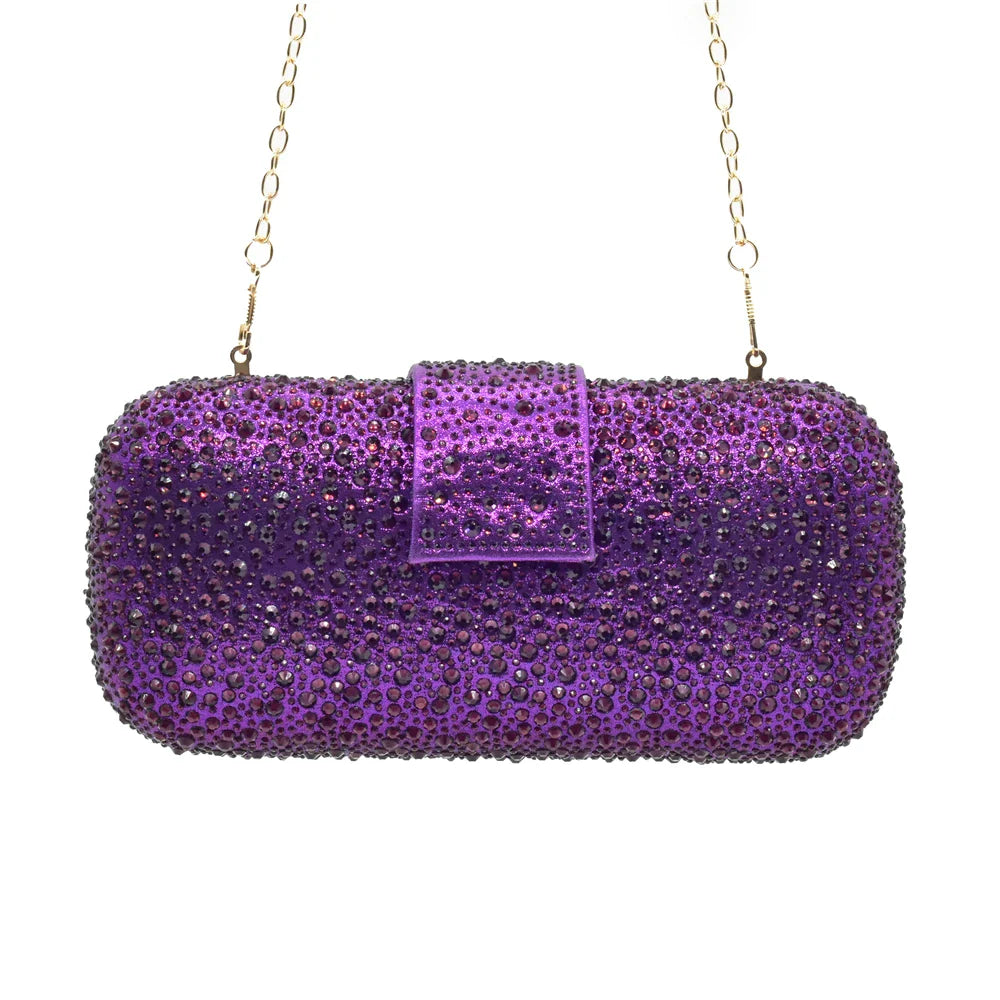 Chic purple Italian women's pumps embellished with rhinestones, accompanied by a complementary handbag, designed for luxury events.