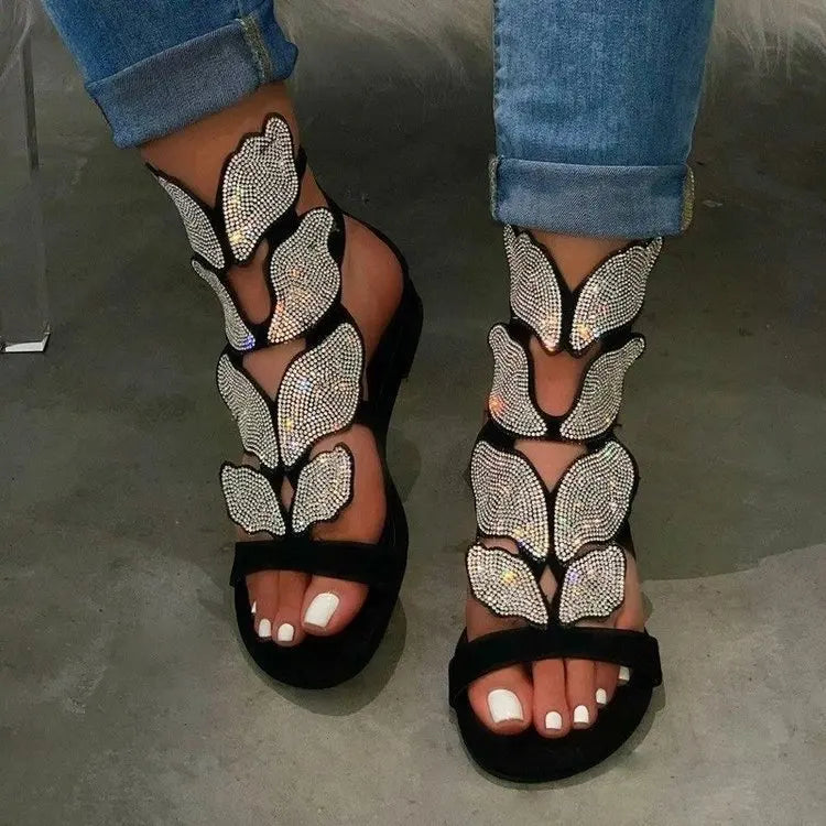 Fashion-forward women's sandals featuring a square heel and butterfly crystal details, offering a luxurious experience for plus size wearers.